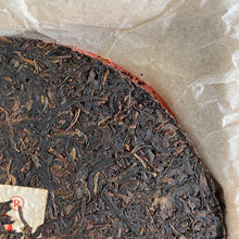 Laden Sie das Bild in den Galerie-Viewer, 2006 XiaGuan "T8653" Iron Cake 357g Puerh Raw Tea Sheng Cha