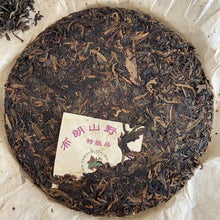Load image into Gallery viewer, 2005 LiuDaChaShan "Bu Lang Shan - Ye Sheng Cha - Te Ji" (Bulang Mountain - Wild Tea - Special Grade) Cake 357g Puerh Raw Tea Sheng Cha, Menghai.