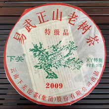 Load image into Gallery viewer, 2009 XiaGuan "Lv Da Shu - Yi Wu Zheng Shan - Lao Shu Cha" (Green Big Tree - Yiwu Mountain - Old Tree) Cake 357g Puerh Raw Tea Sheng Cha