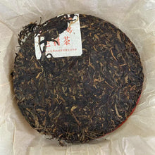 Load image into Gallery viewer, 2009 XiaGuan "Lv Da Shu - Yi Wu Zheng Shan - Lao Shu Cha" (Green Big Tree - Yiwu Mountain - Old Tree) Cake 357g Puerh Raw Tea Sheng Cha
