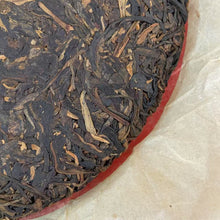 Load image into Gallery viewer, 2009 XiaGuan "Lv Da Shu - Yi Wu Zheng Shan - Lao Shu Cha" (Green Big Tree - Yiwu Mountain - Old Tree) Cake 357g Puerh Raw Tea Sheng Cha