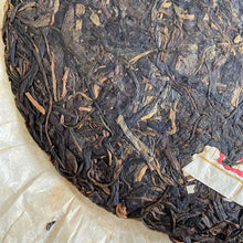 Load image into Gallery viewer, 2012 XiaGuan "Lv Da Shu - Yi Wu Zheng Shan - Lao Shu Cha" (Green Big Tree - Yiwu Mountain - Old Tree) Cake 357g Puerh Raw Tea Sheng Cha
