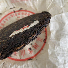 Load image into Gallery viewer, 2012 XiaGuan "Lv Da Shu - Yi Wu Zheng Shan - Lao Shu Cha" (Green Big Tree - Yiwu Mountain - Old Tree) Cake 357g Puerh Raw Tea Sheng Cha
