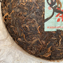 Load image into Gallery viewer, 2006 FuHai &quot;Nan Nuo Shan - Ye Sheng - Da Shu&quot; (NanNuo Mountain - Wild - Big Tree) Cake 357g Puerh Raw Tea Sheng Cha