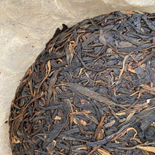 Load image into Gallery viewer, 2012 TianPu "Yi Wu - Qiao Mu" (Yiwu - Arbor Tree) Cake 357g Puerh Raw Tea Sheng Cha