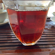 Load image into Gallery viewer, 2006 FuHai "Nan Nuo Shan - Ye Sheng - Da Shu" (NanNuo Mountain - Wild - Big Tree) Cake 357g Puerh Raw Tea Sheng Cha