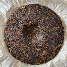 Load image into Gallery viewer, 2005 FuHai "Yi Wu Zheng Shan - Ye Sheng Cha" (Yiwu Mountain - Wild Tea) Cake 357g Puerh Raw Tea Sheng Cha