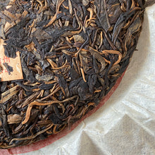 Load image into Gallery viewer, 2005 FuHai "Yi Wu Zheng Shan - Ye Sheng Cha" (Yiwu Mountain - Wild Tea) Cake 357g Puerh Raw Tea Sheng Cha