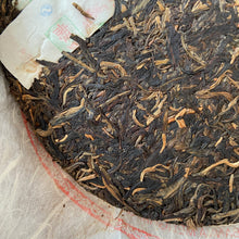 Load image into Gallery viewer, 2006 LiMing &quot;Qiao Mu Gong Rui&quot; (Tribute Arbor Tree - Bu Lang) Cake 357g Puerh Raw Tea Sheng Cha, Meng Hai.