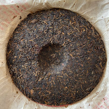 Load image into Gallery viewer, 2005 XingHai "Bu Lang - Mei Hua Bing" (Bulang - Plum Flower Cake) 357g Puerh Raw Tea Sheng Cha