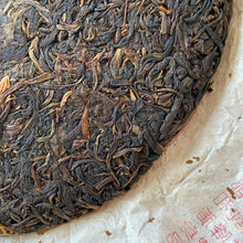 Load image into Gallery viewer, 2005 XingHai "Bu Lang - Mei Hua Bing" (Bulang - Plum Flower Cake) 357g Puerh Raw Tea Sheng Cha