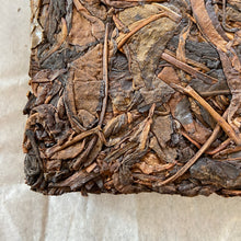 Load image into Gallery viewer, 2014 KingTeaMall "Yi Wu - Gua Feng Zhai - Huang Pian" (Yiwu - GuaFengZhai - Huangpian / Yellow Leaf) Brick 250g Puerh Raw Tea Sheng Cha