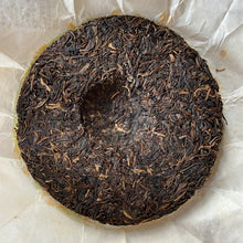 Load image into Gallery viewer, 2015 XiaGuan &quot;Yi Wu Zhi Chun&quot; (Spring of Yiwu) Cake 357g Puerh Sheng Cha Raw Tea