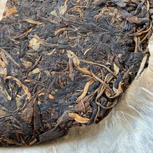 Load image into Gallery viewer, 2007 NanQiao &quot;Yi Wu Zheng Shan - Chun Jian&quot; (Yiwu Mountain - Spring Bud) Cake 357g Puerh Raw Tea Sheng Cha