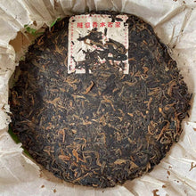 Load image into Gallery viewer, 2004 LiMing "Ban Zhang - Gu Qiao Mu" (Banzhang - Ancient Arbor Tree) Cake 357g Puerh Raw Tea Sheng Cha