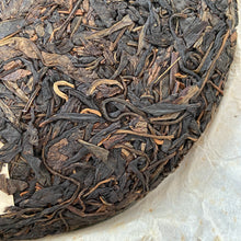 Load image into Gallery viewer, 2007 YiPinTang "Yi Wu Zhi Chun" (Spring of Yiwu) Cake 357g Puerh Raw Tea Sheng Cha