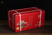 Load image into Gallery viewer, 2017 XiaGuan "Dong Fang Zhi Zhu - Bu Lang Gu Shu" (Oriental Pearl - Bulang Old Tree) Iron Cake 357g Puerh Shou Cha Ripe Tea
