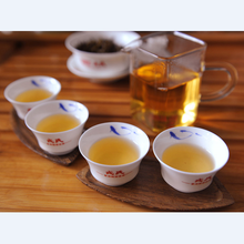 Load image into Gallery viewer, 2014 MengKu RongShi "Huan Xing" (Rising) Cake 2014g Puerh Raw Tea Sheng Cha - King Tea Mall