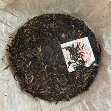 Load image into Gallery viewer, 2006 NanQiao ShuangShiHao &quot;Nan Nuo Shan - Ban Po Lao Zhai &quot; (Nannuo Mountain - Banpo Old Village) Cake 357g Puerh Raw Tea Sheng Cha