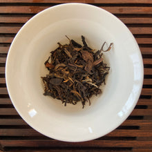 Load image into Gallery viewer, 2006 LiMing "Yu Shang Qiao Mu" (Tribute  Arbor Tree) Organic Cake 357g Puerh Sheng Cha Raw Tea