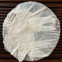 Load image into Gallery viewer, 2005 XingHai "Yin Kong Que - Gu Shu Qiao Mu" (Silvers Peacock - Menghai Old Arbor Tree) 501 Batch Cake 357g Puerh Ripe Tea Shou Cha