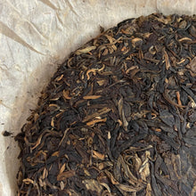 Load image into Gallery viewer, 2006 NanQiao ShuangShiHao &quot;Nan Nuo Shan - Ban Po Lao Zhai &quot; (Nannuo Mountain - Banpo Old Village) Cake 357g Puerh Raw Tea Sheng Cha