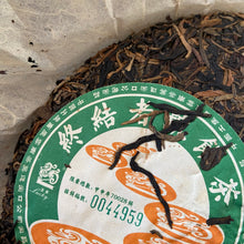 Load image into Gallery viewer, 2004 CNNP &quot;Ji Xing - Zhong Jie Zhe Hao&quot; (Lucky - Terminator) Cake 357g Puerh Raw Tea Sheng Cha