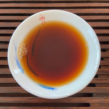 Load image into Gallery viewer, 2005 XingHai &quot;Yin Kong Que - Gu Shu Qiao Mu&quot; (Silvers Peacock - Menghai Old Arbor Tree) 501 Batch Cake 357g Puerh Ripe Tea Shou Cha