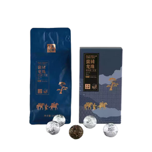 Blue tea packaging with tea balls on a white background