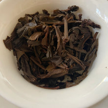 Load image into Gallery viewer, 2003 NanNuoShan Jin Gang- Nan Nuo Shan (NanNuo Mountain Old Tree) Cake 357g Puer - photo 14