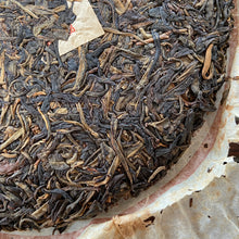 Load image into Gallery viewer, 2003 NanNuoShan Jin Gang- Nan Nuo Shan (NanNuo Mountain Old Tree) Cake 357g Puer - photo 4