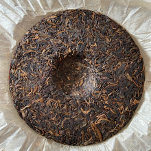 Load image into Gallery viewer, 2005 FuHai Yi Wu Zheng Shan - Ye Sheng Cha (Yiwu Mountain - Wild Tea) Cake 357g  - photo 4