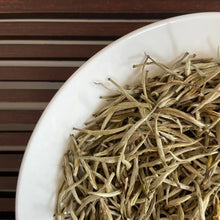 Load image into Gallery viewer, Appearance Tight, neatly curled dark-brown tea threads with a lustrous, slightly reddish sheen. The dry leaves release an inviting natural fragrance the moment the bag is opened.

Liquor Bright, clear amber with a reddish-golden glow.

Aroma &amp; Flavor Rich honey-like sweetness layered with ripe fruit (stone fruit, longan) and delicate floral notes. The taste is smooth and full-bodied, naturally sweet, with minimal bitterness and a pleasant, mouth-watering quality. It produces abundant saliva and delivers