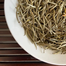 Load image into Gallery viewer, Appearance Tight, neatly curled dark-brown tea threads with a lustrous, slightly reddish sheen. The dry leaves release an inviting natural fragrance the moment the bag is opened.

Liquor Bright, clear amber with a reddish-golden glow.

Aroma &amp; Flavor Rich honey-like sweetness layered with ripe fruit (stone fruit, longan) and delicate floral notes. The taste is smooth and full-bodied, naturally sweet, with minimal bitterness and a pleasant, mouth-watering quality. It produces abundant saliva and delivers