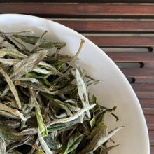 Load image into Gallery viewer, The 2025 Spring "Bai Mu Dan - 1 Ji" (Baimudan - 1st Grade) A++++ is an exemplary loose leaf white tea, sourced from the celebrated tea-growing region of Fuding, Fujian Province. This tea represents the pinnacle of quality with its A++++ grade, ensuring that only the finest, most carefully harvested leaves are selected.


Crafted from the early spring harvest of 2025, this Bai Mu Dan or White Peony tea is made from the tender buds and top leaves, which are picked when their flavor and aroma are at their peak