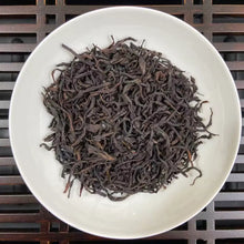 Load image into Gallery viewer, From the mist-shrouded peaks of Wu Dong Mountain, the historic heart of Phoenix Single Bush in Chaozhou, Guangdong, comes one of the most sought-after DanCong lots of the 2024 spring harvest: “Dong Fang Hong” – Eastern Red.

Grown at 1,100–1,250 m altitude on ancient, wild-arbor tea trees (some exceeding 100 years), this S+ grade selection is hand-picked in mid-April from the celebrated “MiLan Xiang” (Honey-Orchid Fragrance) cultivar lineage. Only the finest one-bud-two-leaf sets are chosen, ensuring extrao