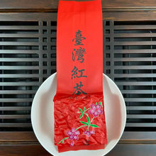 Load image into Gallery viewer, Appearance Tight, neatly curled dark-brown tea threads with a lustrous, slightly reddish sheen. The dry leaves release an inviting natural fragrance the moment the bag is opened.

Liquor Bright, clear amber with a reddish-golden glow.

Aroma &amp; Flavor Rich honey-like sweetness layered with ripe fruit (stone fruit, longan) and delicate floral notes. The taste is smooth and full-bodied, naturally sweet, with minimal bitterness and a pleasant, mouth-watering quality. It produces abundant saliva and delivers