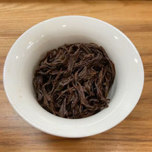 Load image into Gallery viewer, Appearance Tightly and black, large tea threads. Dry leaves release an intense natural aroma of cinnamon, rose petals, and cool mint even before brewing.

Liquor Vivid ruby-red with jewel-like transparency and brightness.

Aroma &amp; Taste Profile

Signature “Taiwan Red Trilogy”: cinnamon warmth + damask rose + refreshing mint coolness
Pronounced honey and ripe stone-fruit sweetness
Zero astringency, silky-smooth body
Powerful, long-lasting sweet aftertaste (hui gan) and a cooling sensation that reaches de