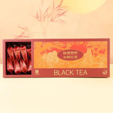 Load image into Gallery viewer, Chinese black tea gift box with individually wrapped tea packets, red and gold packaging