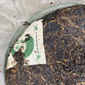 2005 JingChangHao "Meng Hai Qiao Mu" (Menghai Arbor Tree) Cake 357g Puerh Sheng Cha Raw Tea