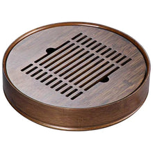Load image into Gallery viewer, Product Name: Round Tea Tray

Material: Bamboo + Laminate Board Base

Size:

Small : Diameter 25 * Height 5 cm

Medium: Diameter 29 * Height 5 cm

Large : Diameter 38 * Height 5 cm



This Round Tea Tray is an exquisite piece of craftsmanship, designed for the ritual of Gongfu tea, a traditional Chinese method of tea preparation that focuses on the aesthetic presentation and sharing. The tray is constructed from high-quality bamboo, a material revered for its durability and natural beauty.

The surface of t