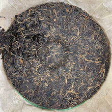 Load image into Gallery viewer, 2004 LiMing "Nan Huo Shan · Chun · Gu Qiao Mu" (Nannuo Mountain · Spring · Old Arbor Tree) Cake 357g Puerh Raw Tea Sheng Cha