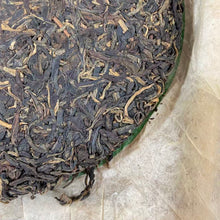 Load image into Gallery viewer, 2004 LiMing "Nan Huo Shan · Chun · Gu Qiao Mu" (Nannuo Mountain · Spring · Old Arbor Tree) Cake 357g Puerh Raw Tea Sheng Cha