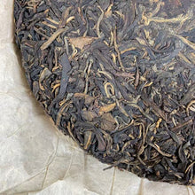 Load image into Gallery viewer, 2004 LiMing "Nan Huo Shan · Chun · Gu Qiao Mu" (Nannuo Mountain · Spring · Old Arbor Tree) Cake 357g Puerh Raw Tea Sheng Cha