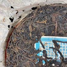 Load image into Gallery viewer, 2005 ChenYunHao "Yi Wu Zheng Shan - Lao Shu Cha" (Yiwu Mountain - Old Tree - Wet Storage) Cake 357g Puerh Raw Tea Sheng Cha