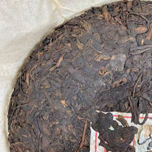 Load image into Gallery viewer, 2015 LanCang GuCha "Jing Mai Chen Chun" (Jingmai Mountain - Aged &amp; Mellow - Arbor &amp; Old Tree Blend) 357g Puerh Ripe Tea Shou / Shu Cha