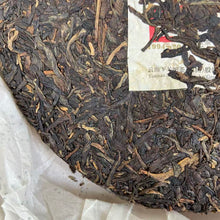 Load image into Gallery viewer, 2014 XiaGuan "8653" 357g Puerh Sheng Cha Raw Tea