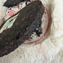 Load image into Gallery viewer, 2005 XiaGuan "FT8653" Iron Cake 357g Puerh Raw Tea Sheng Cha