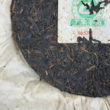 Load image into Gallery viewer, 2008 XiaGuan "Lv Da Shu - Yi Wu Zheng Shan - Lao Shu Cha" (Green Big Tree - Yiwu Mountain - Old Tree) Cake 357g Puerh Raw Tea Sheng Cha