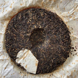 2007 LiMing "Bu Lang Shan - Qiao Mu Gu Shu - Nv Er Gong Bing" (Bulang Mountain - Ancient Arbor Tree) Cake 357g Puerh Raw Tea Sheng Cha